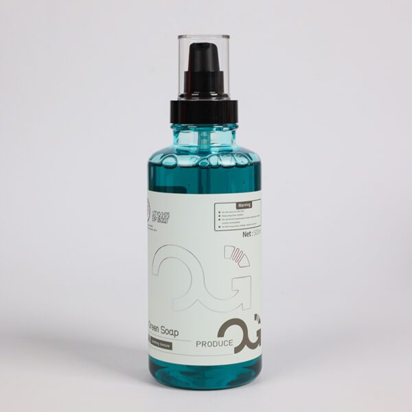 Clear bottle of blue liquid soap with a pump dispenser.