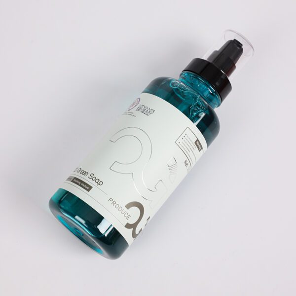 Blue pump bottle with white label on a white background.
