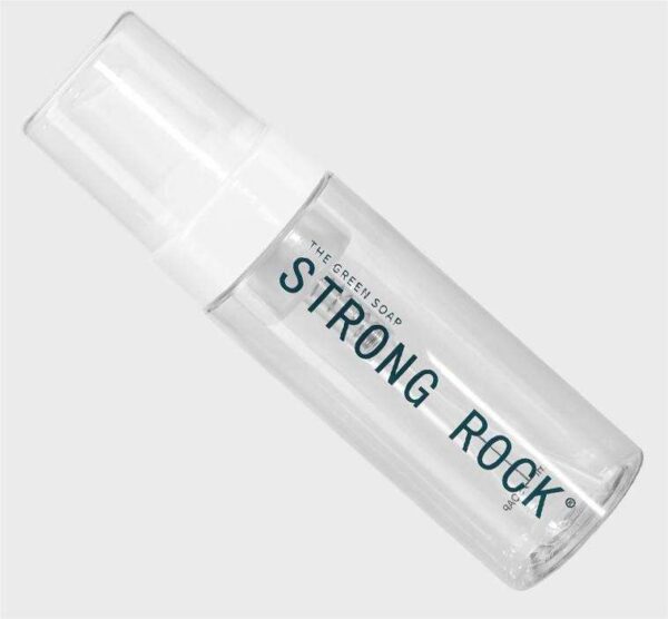 Clear bottle labeled "Strong Rock" soap on a white background.