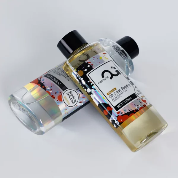Three bottles of color solution on a white background.