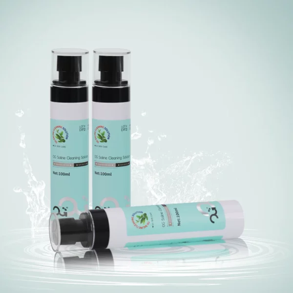 Three skincare bottles with green labels on a watery surface.