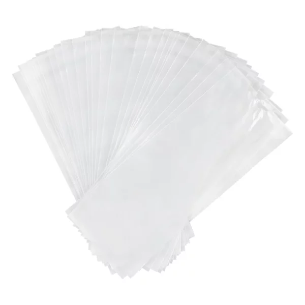 Stack of clear plastic bags fanned out on a white background.