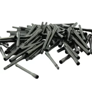 Pile of black plastic tubes scattered on a white background.