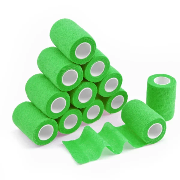 Ten green adhesive bandage rolls stacked in a pyramid shape.